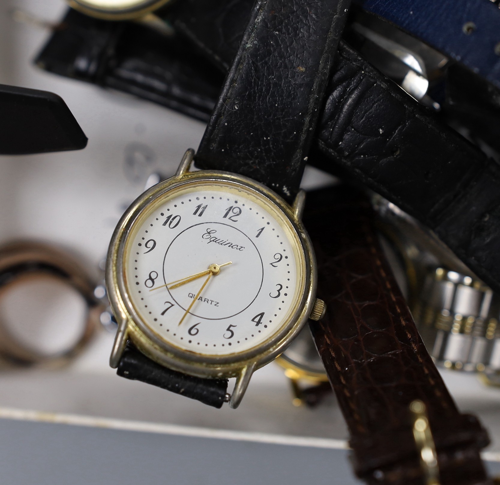 A group of assorted wrist watches, an Ingersoll pocket watch and sundries